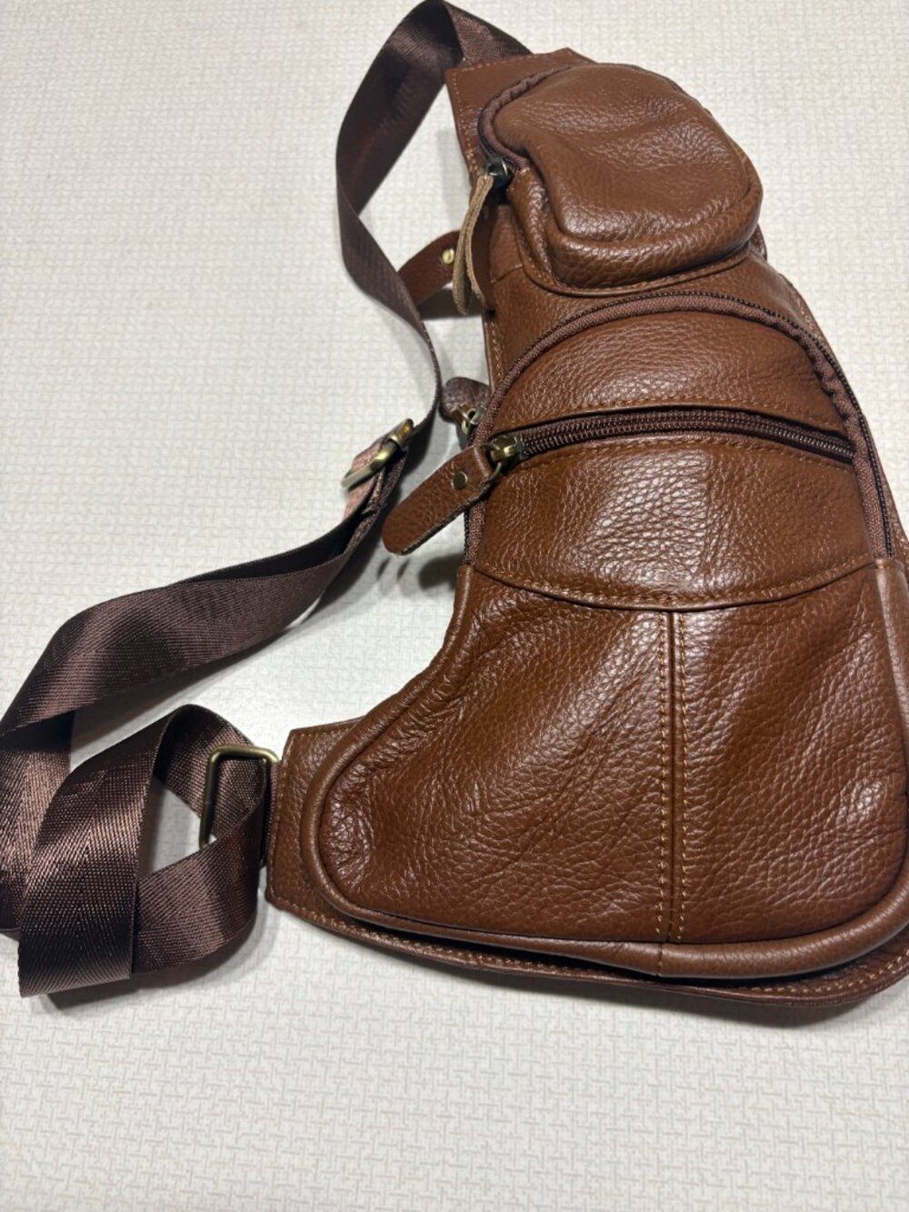 Brown Leather Sling with multiple pockets